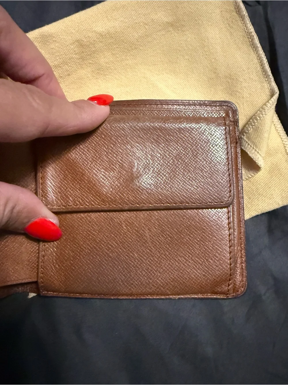 Louis Vuitton authentic Monogram Canvas Bi-Fold Wallet in Brown and Tan
